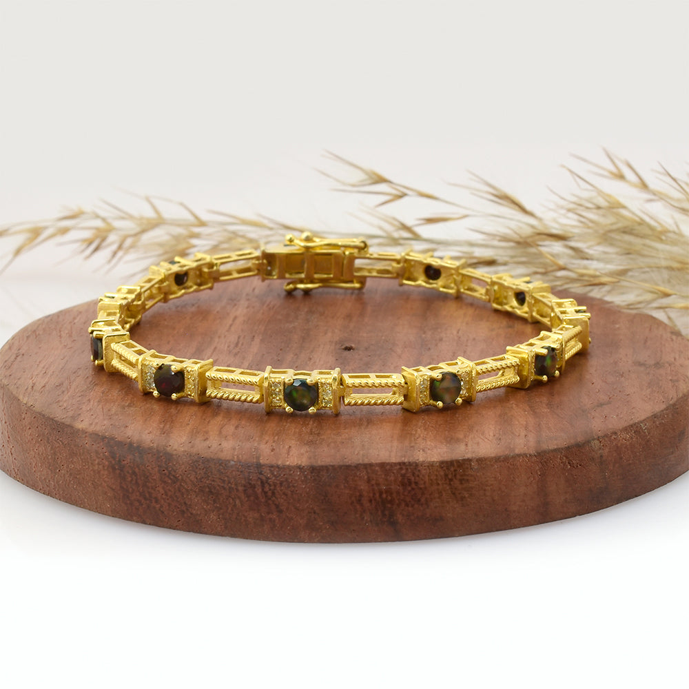 Pulsera de Plata Bañada en Oro con Ópalo Etíope de Lega Dembi y Topacio Blanco
