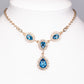 Conjunto de Aleación Bañado en Oro con Cristal Emporia® Azul y Cristal Emporia® Blanco ( Collar +Pendientes +Pulsera )