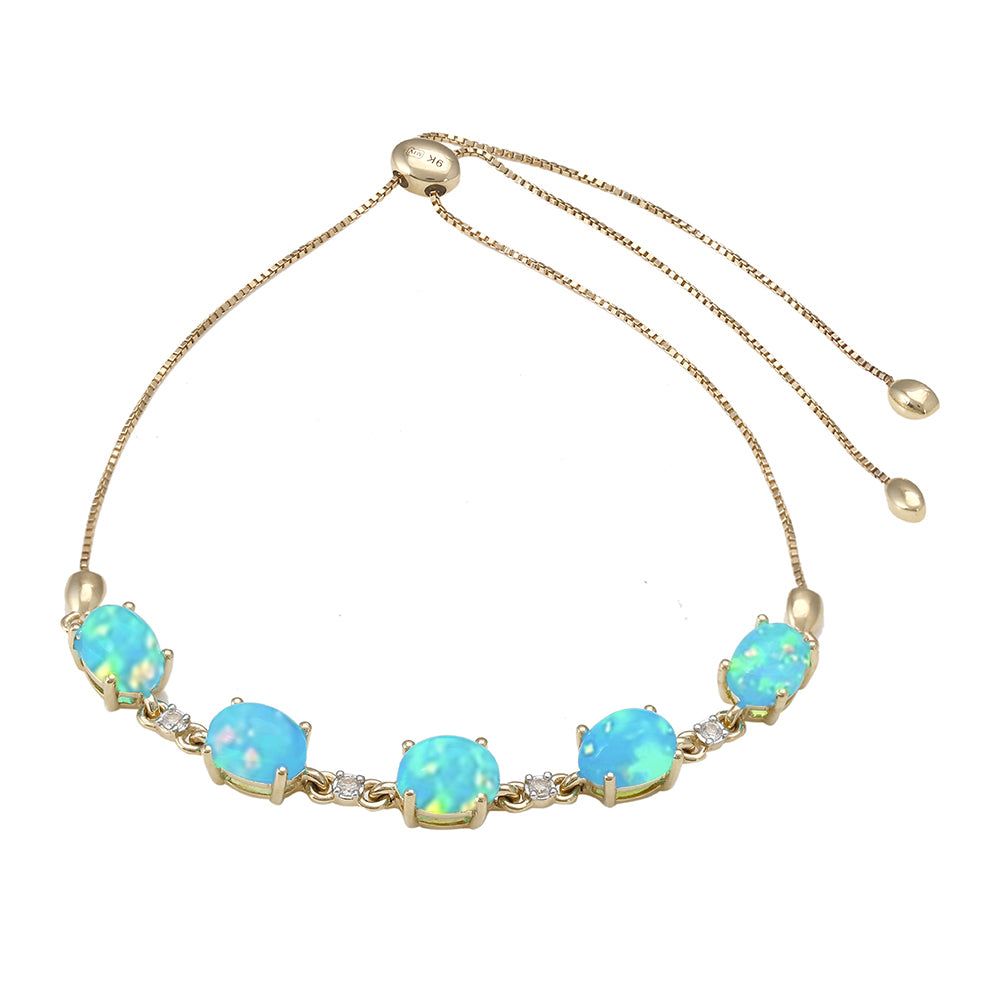 Pulsera de Oro 9K con Ópalo Azul Paraiba de Etiopía y Topacio Blanco