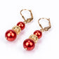 Pendientes de Plata Bañada en Oro con Perla roja de río
