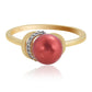 Anillo de Plata Bañada en Oro con Perla roja de río y Topacio Blanco