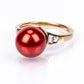 Anillo de Plata Bañada en Oro con Perla roja de río y Topacio Blanco