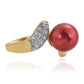 Anillo de Plata Bañada en Oro con Perla roja de río y Topacio Blanco