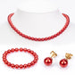 Conjunto de Plata Bañada en Oro con Perla roja de río ( Collar +Pendientes +Pulsera )
