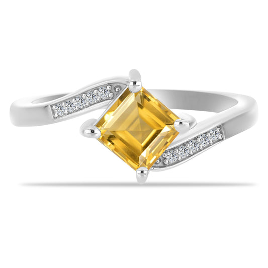 Anillo de Plata con Citrino de los Montes Urales y Topacio Blanco