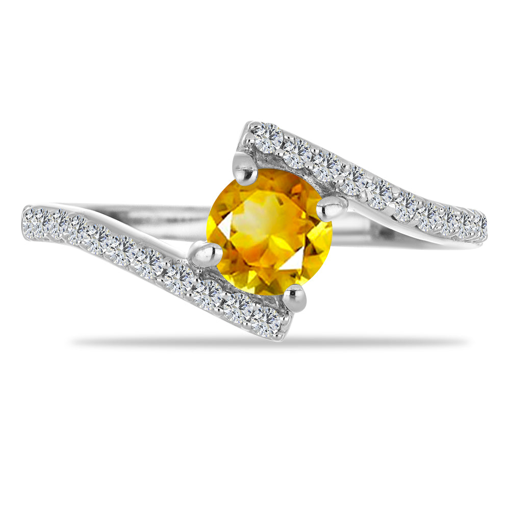Anillo de Plata con Citrino de los Montes Urales y Topacio Blanco