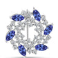 Broche de Plata con Tanzanita y Topacio Blanco