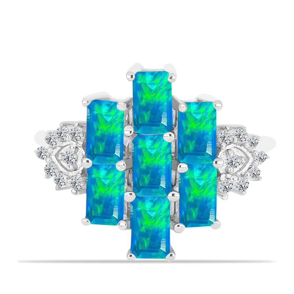 Anillo de Plata con Ópalo Azul Paraiba de Etiopía y Topacio Blanco