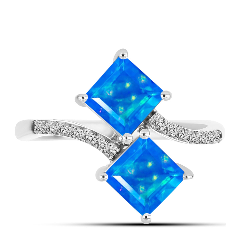 Anillo de Plata con Ópalo Azul Paraiba de Etiopía y Topacio Blanco