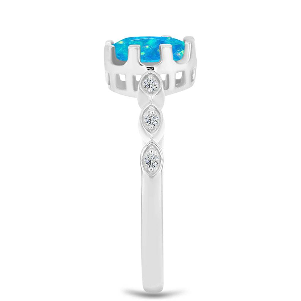 Anillo de Plata con Ópalo Azul Paraiba de Etiopía y Topacio Blanco