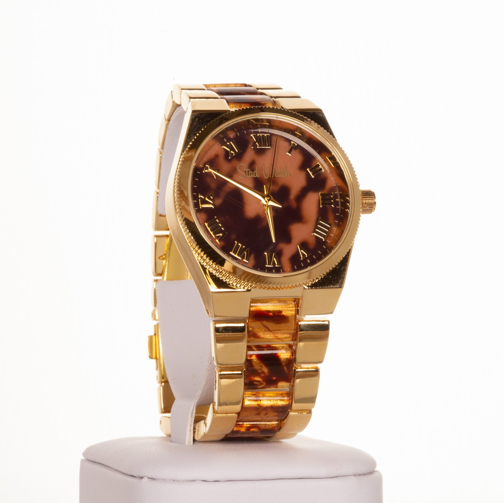 Reloj de aleación para mujer en color dorado con rayas de tigre y esfera con números romanos 1 